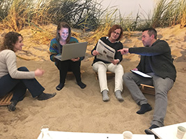 vergaderen in het zand